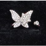 Ezüstszínű gyűrű, pillangóval, forgó csillag mintával