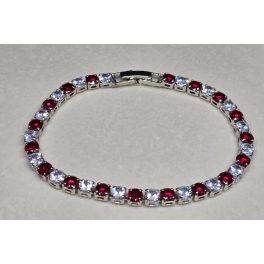 Ezüstszínű teniszkarkötő, piros-áttetsző kövekkel