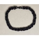 Indás, elegáns karkötő arany-, ezüst-, fekete színű